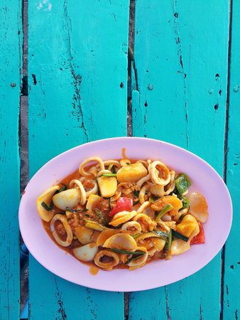 Stir Fried squid with salted egg york in night dining resturantの素材