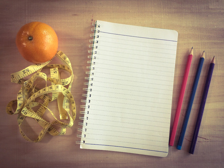 blank notbook on working desk with copy space for create job or education or anything if you wantの写真素材