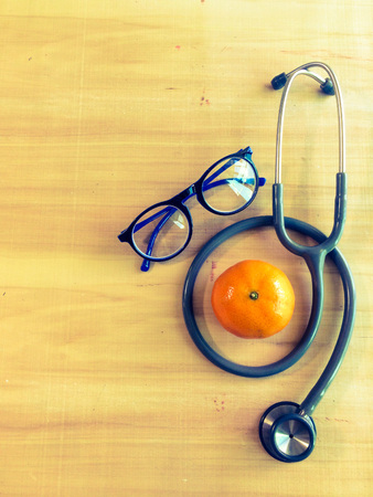 close up stethoscopes for doctor working or education with copy spaceon desk tableの写真素材