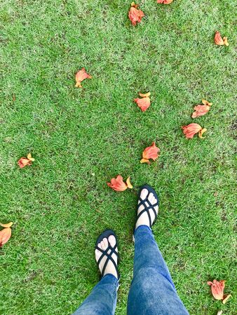 Standing on the vintage  groundfloor, walking street concept,relax your feet by take a some trip for your lifeの写真素材