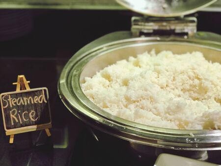 Close up steamed rice in rice cookerの写真素材