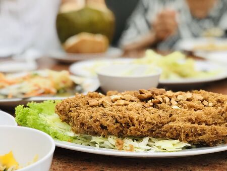close up fried Fish on dish, food for health conscious peopleの写真素材