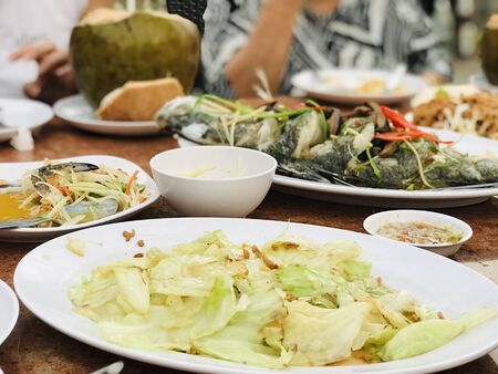 top view of fried cabbage with fish sauce, food travel and cuisine