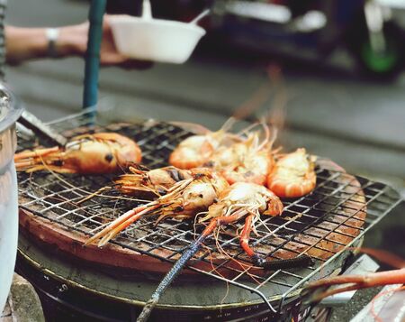 close up grilled prawns with spicy seasoning, food Thailand travel street food conceptの写真素材