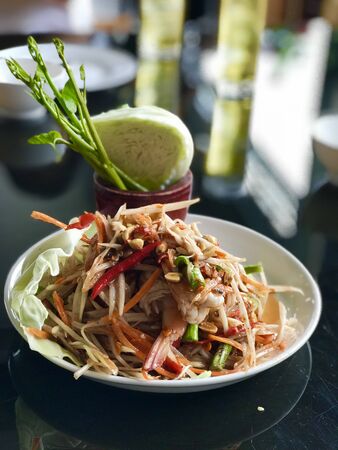 top view of Somtum is famous Thai food, spicy salad good for dietの写真素材