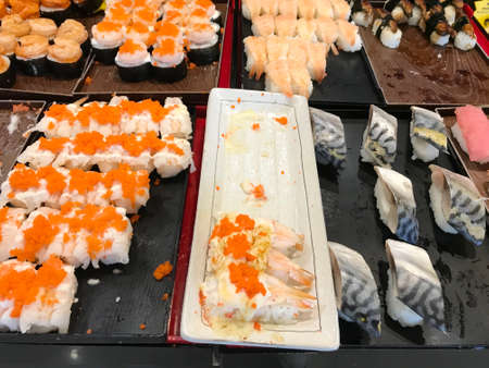 Shushi and sashimi buffet in night dining resturantの写真素材