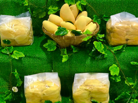 close up ripe mango texture pattern background, sale in the marketの写真素材