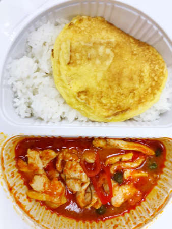 box lunch, a meal eaten in the middle of the day that you take to school or work with you in a box lunchの写真素材