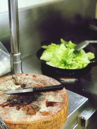Chopping boards and knives, kitchen equipment, food preparing for cooking in the kitchen roomの写真素材