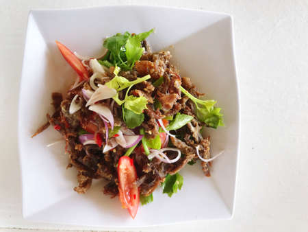 top veiw of Crispy Duck Salad on the food table with copy space, food and cuisine travel concept