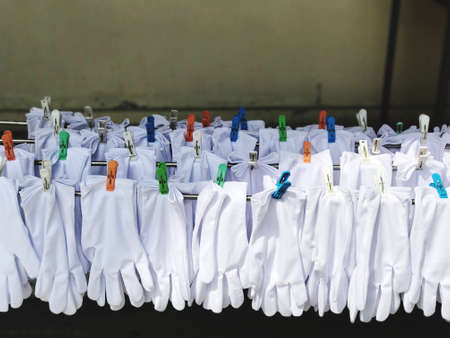 dry fabric glove in the sun, Laundry Service conceptの写真素材