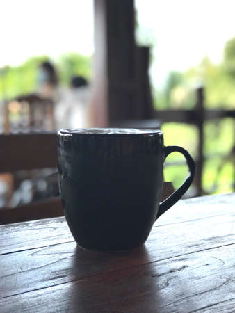 A cup of smoothie coffee is laid out on the terrace in a restaurant with a very good atmosphereの写真素材