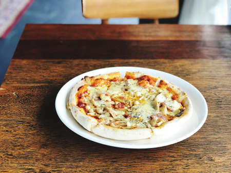 pizza pice paste on white dish background with copy spaceの写真素材