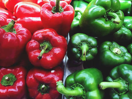 Red capsicum and green bell pepper, healthy agricultural produceの写真素材