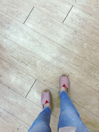 Standing on the vintage  groundfloor, walking street concept,relax your feet by take a some trip for...