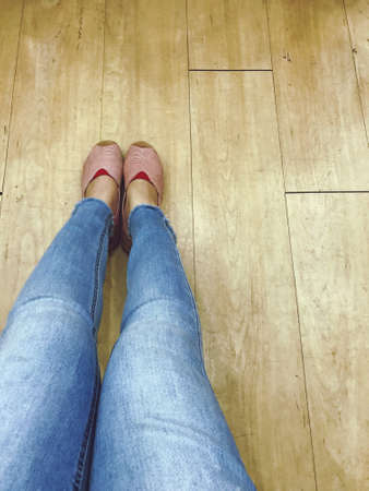 Standing on the vintage  groundfloor, walking street concept,relax your feet by take a some trip for your lifeの写真素材