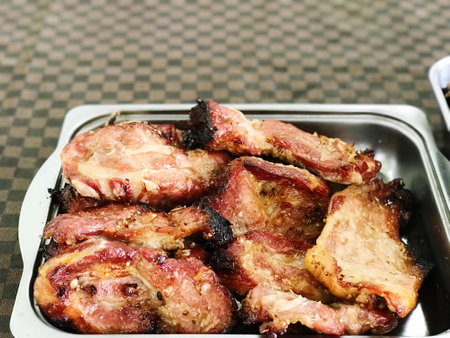 close up grilled pork with spicy dip sauce, food cuisine and travelの写真素材