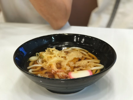 An image of a cup of udon or ramen as food Japanese style served hotの写真素材