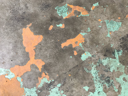 Grunge concrete wall texture with peeling paint. Abstract background for design.