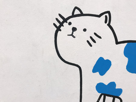 Painted cat on the wall of the building, street art conceptの写真素材