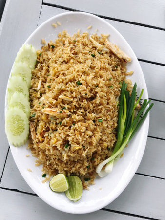Fried rice with shrimp on white plate, Thai style food.の写真素材