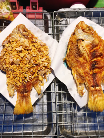 Fried tilapia fish in street food,Thailand.