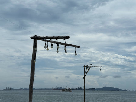 Post in the sea with the blue sky background, Thailand.