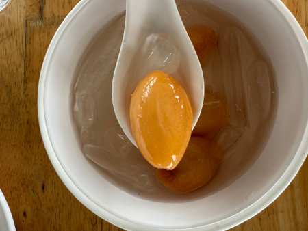 Thai dessert made from sweet and sour apricots in syrup.