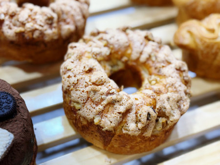 Fresh baked pastries on display in a bakery shop, close up
