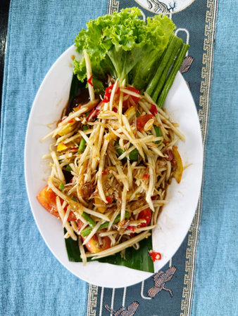 Papaya salad or Somtum is a popular thai foodの写真素材