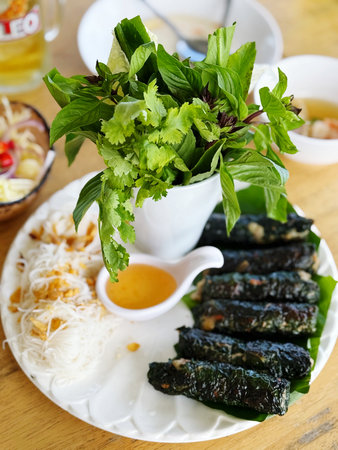 Fried fish with spicy sauce and vegetable on plate. Thai food
