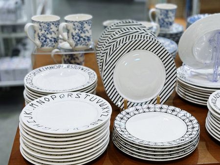 Ceramic tableware on display in a shop, France.