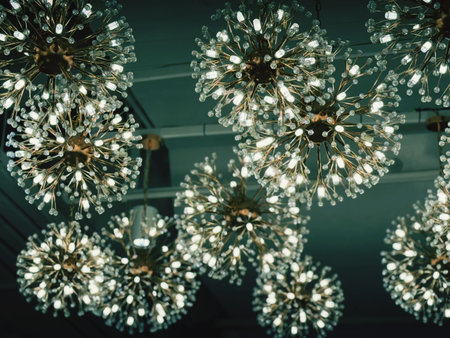 beautiful crystal chandelier hanging on the ceiling in the roomの写真素材
