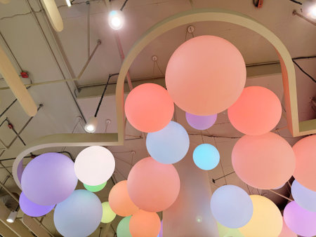 Colorful balloons in the interior of a shopping mall, closeup of photo