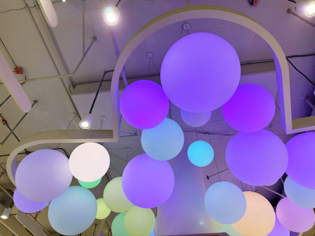 Colorful balloons in the interior of the shopping mall, closeup of photoの写真素材
