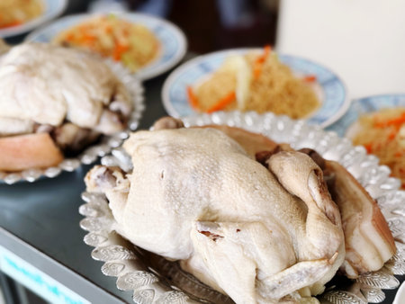 Boiled chicken on the table in the restaurant. Close up.