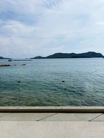 view of the sea from the terrace of a modern house.