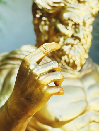 golden hand in the temple, thailand.の写真素材