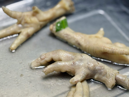 chicken wings are on a tray.の写真素材