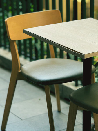 Wooden table and chair in coffee shop - vintage effect style pictures