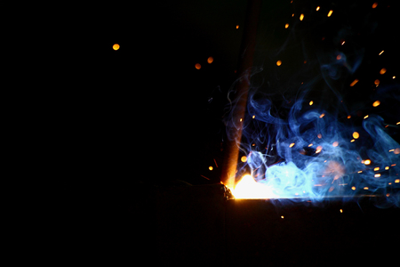 Metal Welding with sparks and smoke