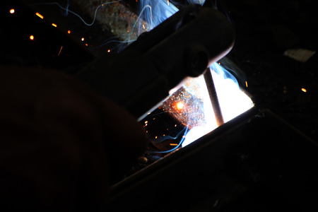 Metal Welding with sparks and smoke