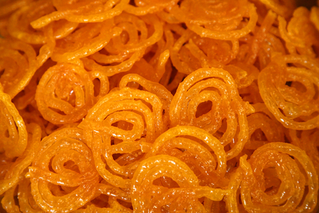 Delicious jalebi frying in oil panの写真素材