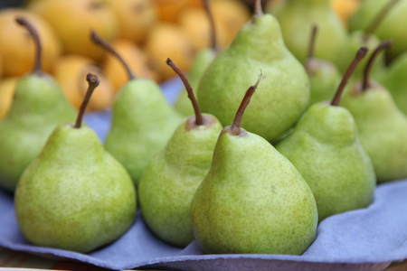 peer fruit in market stallの写真素材