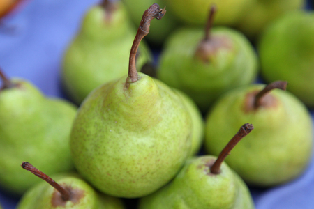 peer fruit in market stallの写真素材