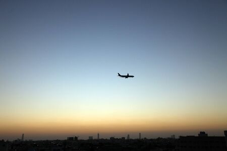 Sunset scene with buildings silhouette in countryside of Jeddah, Saudi arabiaの写真素材