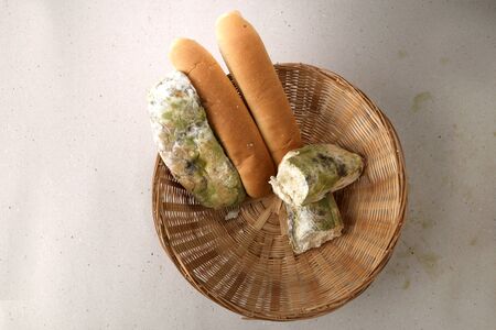 Mildew on bread. Spoiled foods that are harmful to consumption