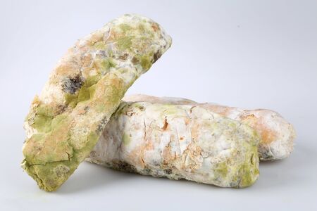 Mildew on bread. Spoiled foods that are harmful to consumption
