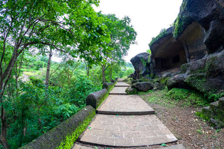 Kanheri caves city Mumbai state maharashtra in India. It is a ancient monuments and old temple building related to God budha. It is situated in the mid of forest in borivali on 21 August 2019の写真素材