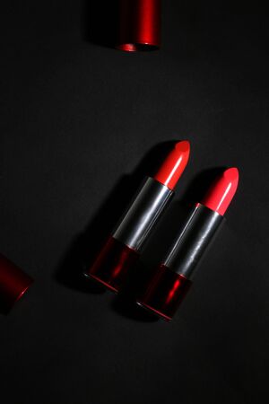 Lipstick. Fashion Colorful Lipsticks over black background. Lipstick tints palette, Professional Makeup and Beauty. Beautiful Make-up concept. Lipgloss. Lipsticks closeupの写真素材